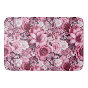Butterflies and Flowers in varying shades of pink Bath Mat