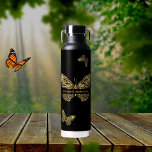 Butterflies black gold name script water bottle<br><div class="desc">Faux gold butterflies on a black background.  Personalize and add your name.</div>