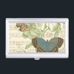 Butterflies on Sheet Music with Floral Design Business Card Holder<br><div class="desc">A green floral design and sheet music serves as the background to a trio of butterflies in this piece by Vision Studio. The French word for butterfly, papillon, is emblazoned at the bottom of the piece as well. If you have a strong love of butterflies, nature, or just like surrounding...</div>