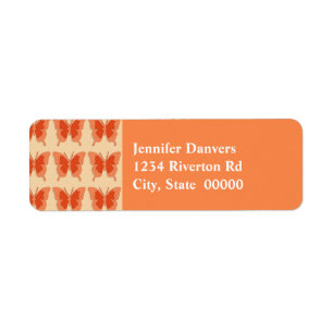 Butterflies, orange on a pastel orange background