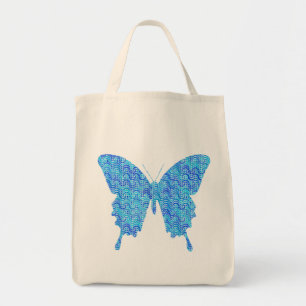 Butterfly image, abstract pattern, shades of blue tote bag