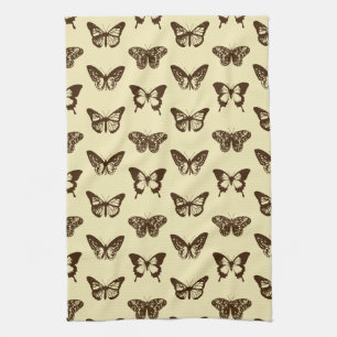Butterfly sketch, chocolate brown on beige kitchen towel
