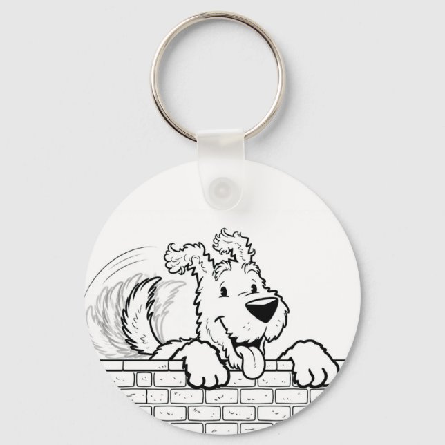 Button-style keychain with a dog design (Front)