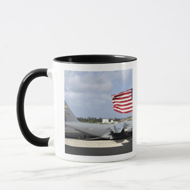 C-17 Globemaster III sits on the flightline Mug (Left)