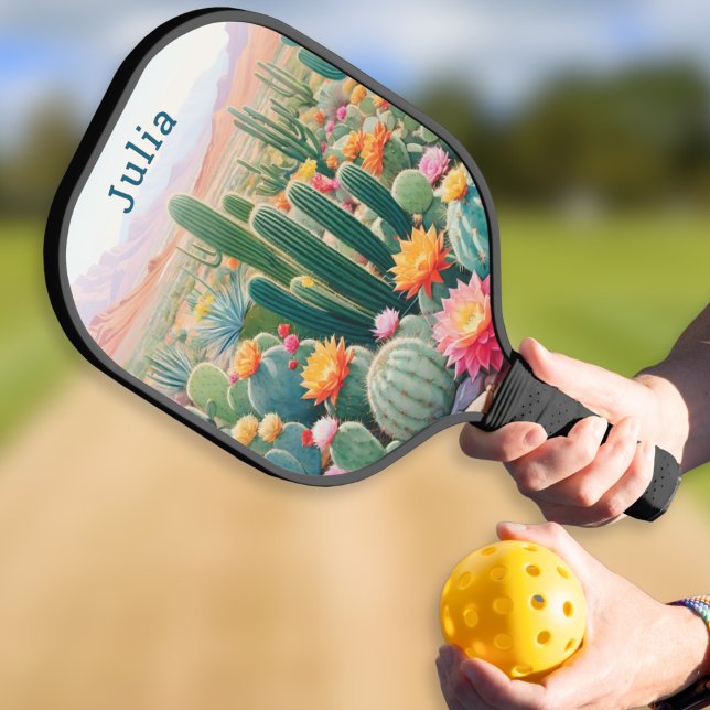 Cactus Desert Flowers Personalized Pickleball Paddle (A personalized pickleball paddle with illustration of flowering cacti in a desert landscape)