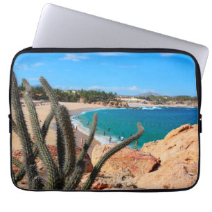 Cactus On Rocky Hilltop Over Sandy Beach Laptop Sleeve