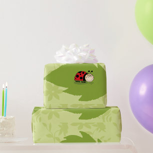 Cadeau Ladybug Sur Un Papier D'Enveloppement De La Feuill