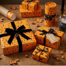 Papier d'emballage Halloween orange avec sorcières