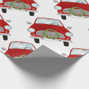 Cadeau Voiture rouge avec papier enveloppant de couronne