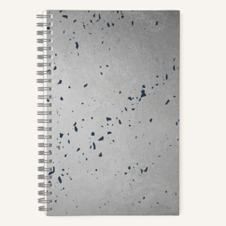 Cahier avec éclaboussures de peinture grise