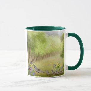 Cailles dans une tasse de sonnerie de pré