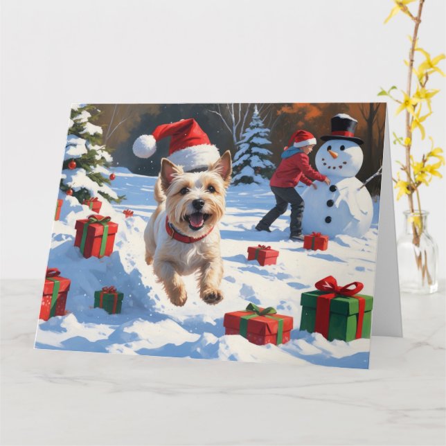 Cairn Terrier Running in Snow with Christmas Hat Card (Yellow Flower)