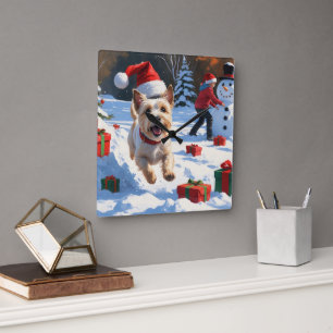 Cairn Terrier Running in Snow with Christmas Hat Square Wall Clock