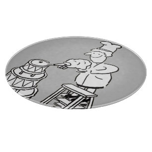 Cake Maker Decorating A Giant Sized Cake Cutting Board