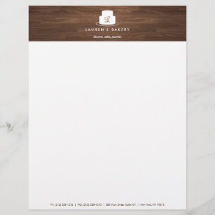 Cake Monogram Logo in White on Brown Woodgrain Letterhead
