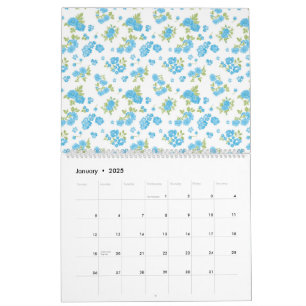 Calendrier un arrière - plan blanc aux fleurs bleues et au le