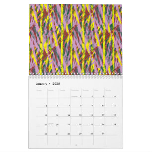 Calendrier Un chat gris et moelleux aux yeux verts s'installe