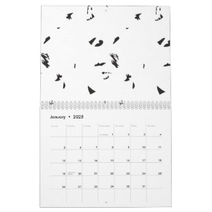 Calendrier Un troupeau d'oiseaux volant dans le ciel.