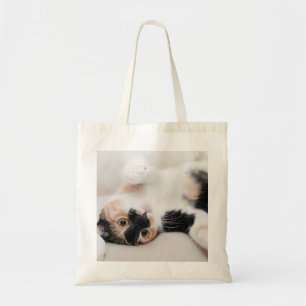 Calico Cat Laying on his back with paws up Tote Bag
