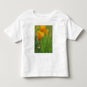California golden poppies in a green field toddler t-shirt