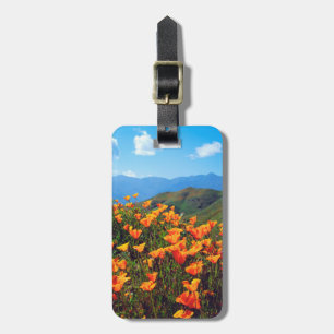 California poppies covering a hillside luggage tag
