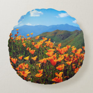 California poppies covering a hillside round pillow