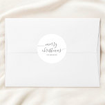 Calligraphy Minimalist Merry Christmas White Classic Round Sticker<br><div class="desc">Introducing our Personalized Round Sticker, where festive elegance meets a personal touch. Emblazoned with the heartfelt phrase "Merry Christmas" in a contemporary modern script, this sticker instantly imbues any surface with the joy of the season. But what truly sets it apart is the space beneath the festive greeting, reserved for...</div>