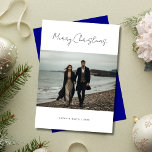 Calligraphy Nautical Navy Christmas Photo Beach Holiday Card<br><div class="desc">Send warm wishes from the beach with this navy Christmas photo card! Featuring elegant calligraphy and a nautical theme,  it's perfect for spreading holiday cheer. Whether it's a fun family photo or a simple,  beachy vibe,  this card brings tropical joy to everyone with a modern,  budget-friendly design.</div>