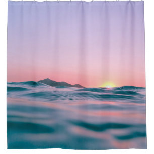 Calm body of water during golden hour