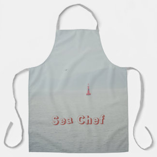 Calm winter sea and red lighthouse apron