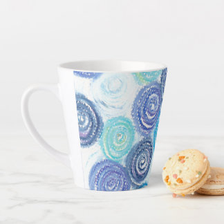 Calming circles created with hues of blue latte mug