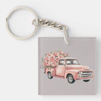 Camion rose avec des roses