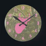 Camo & Pink Deer Clock<br><div class="desc">A clock featuring a pink deer illustration over a camouflage background.</div>