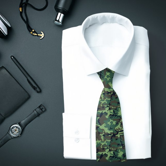 Camouflage Necktie (A green camo necktie is featured on an assemblage of men's fashion accessories.)