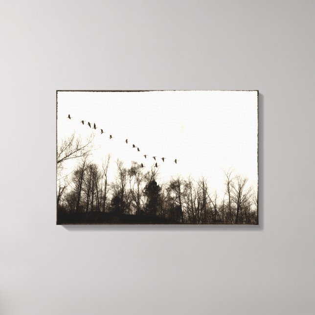 Canada Geese Flying Over Treeline Warm Monochrome Canvas Print (Front)