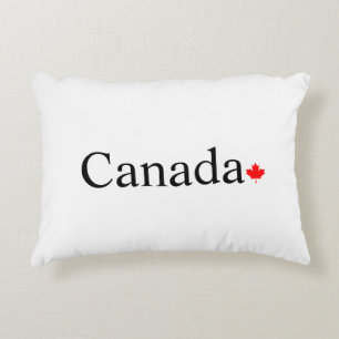 Canada typography with red maple leaf white accent pillow