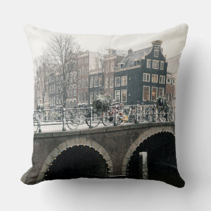 Canal in Amsterdam in winter Throw Pillow