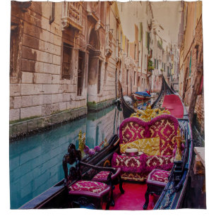Canal with traditional gondola in Venice, Italy