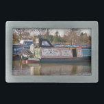 CANALS BELT BUCKLE<br><div class="desc">Canal boats, known in the UK as narrowboats, were originally used to transport goods around the country. They are now used mainly for leisure and attract people from all over the world to enjoy our rural countryside. These boats look very pretty with their brightly coloured cabins, traditionally blue, red or...</div>
