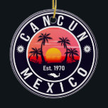 Cancun Mexico Palm Tree Vintage Travel Souvenir Ceramic Ornament<br><div class="desc">Cancun Beach Mexico Vintage 60s Souvenirs. Cancún Beach Mexico - Retro Tropical Palm Tree 60s Souvenirs Vintage design makes a great Christmas or Birthday gift for fans of Cancun Beach beach. The retro summer vibe design is a perfect gift for travel lovers and tropical destination fans.</div>