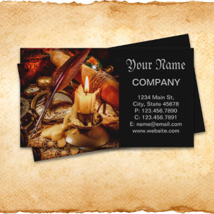 Candles and ancient navigation tools business card