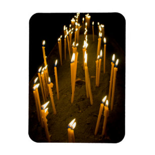 Candles lit in a church, Armenia Magnet