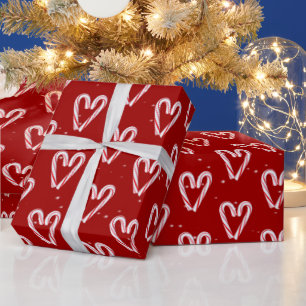 Candy Cane Hearts And Snowflakes On Red Wrapping Paper