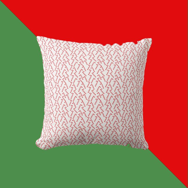 Candy Cane Pattern Red and White Throw Pillow (A throw pillow with a red and white candy cane Christmas pattern)