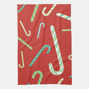 Candy Canes on a Red background Kitchen Towel