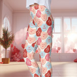 Candy Conversation Hearts Valentine's Day Leggings<br><div class="desc">Add a sweet and playful touch to your Valentine's Day with these Candy Conversation Hearts leggings. Featuring an array of classic conversation hearts in red, pink, peach, and blue, these leggings are perfect for spreading love and joy. The bright, colourful hearts display cute messages like "Be Mine" and "XOXO, "...</div>