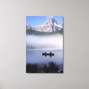 Canoe fishing Waterfowl Lake, Banff National Canvas Print