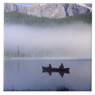 Canoe fishing Waterfowl Lake, Banff National Tile