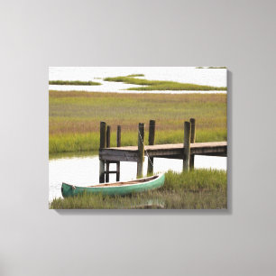 Canoe in water canvas print