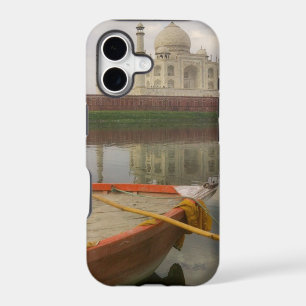 Canoe in water with Taj Mahal, Agra, India
